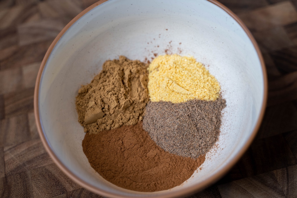 aromatic herbal honey ingredients in a bowl